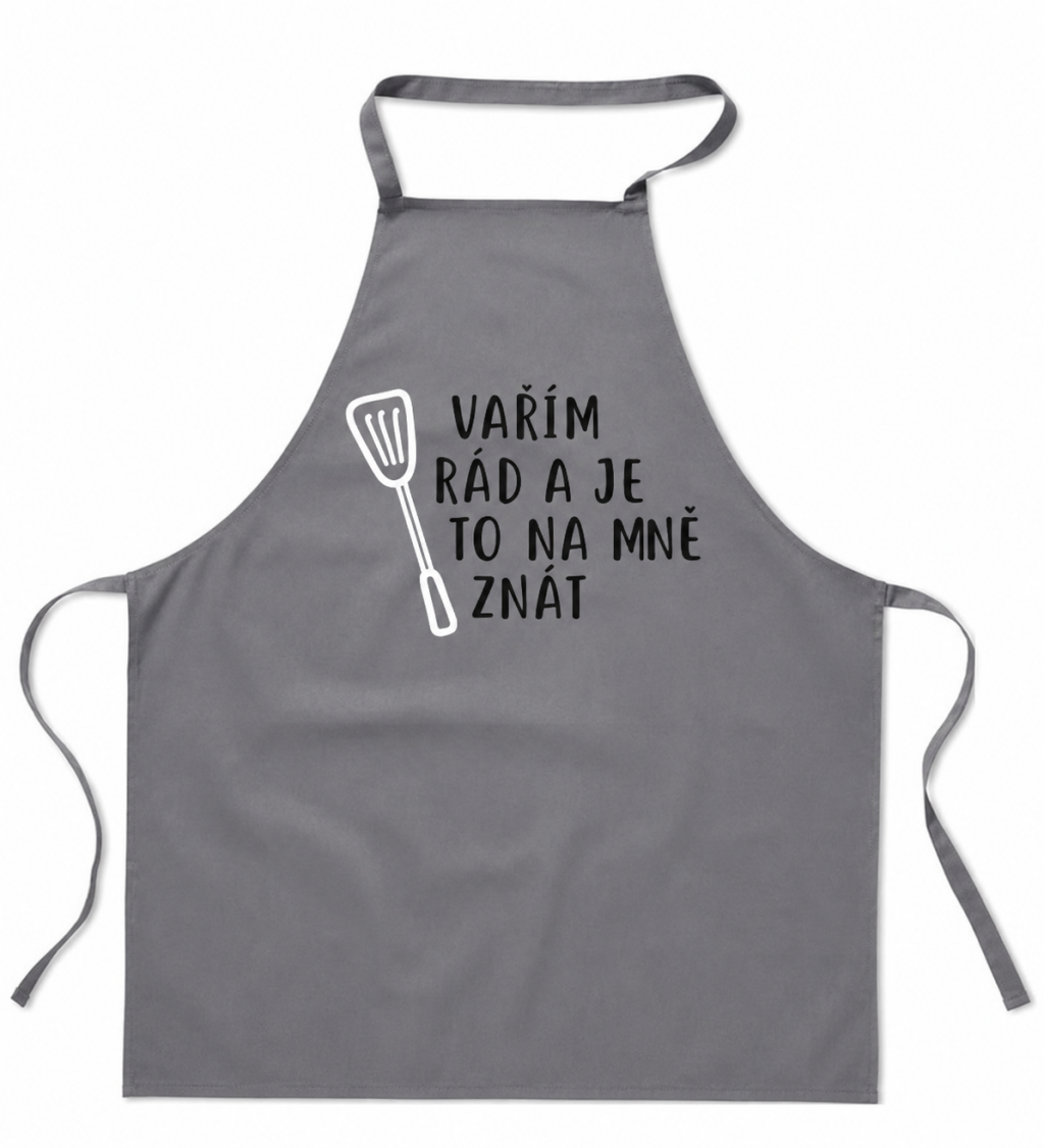 Zástěra s nápisem Vařím rád a je to na mě znát - šedá