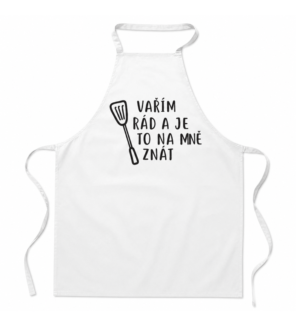 Zástěra s nápisem - Vařím rád a je to na mě znát - bílá